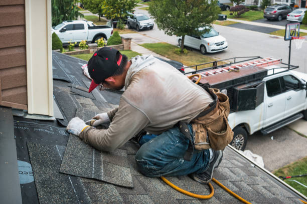 Professional Gutter Repair And Installation technician working in Starbuck, WA